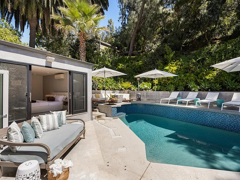 Abundant outdoor furniture, offering ample space for relaxation and enjoyment.