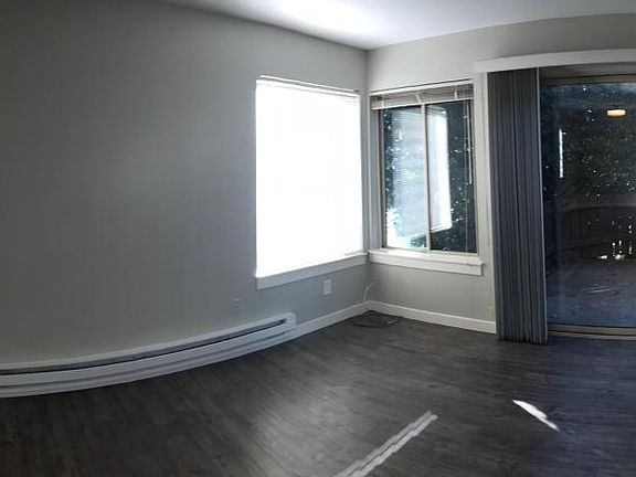Living room with patio (with view of dining area)