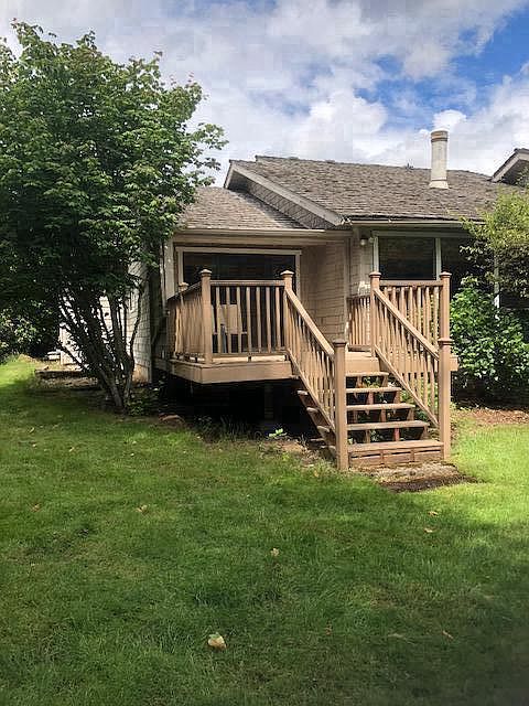 Backyard facing rear of house