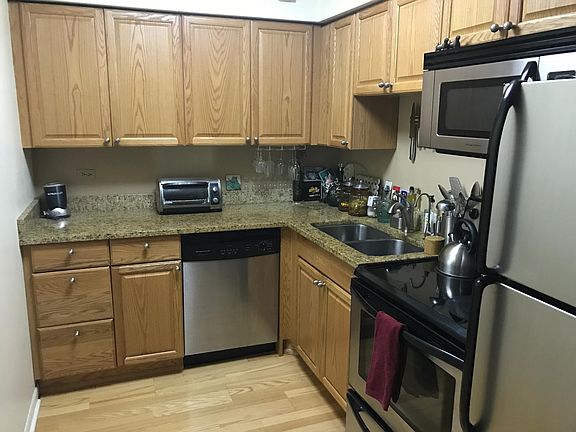 Kitchen - stainless steel appliances including a new dishwas