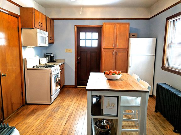 Large eat in kitchen, lots of storage with two pantries plus utility closet.
