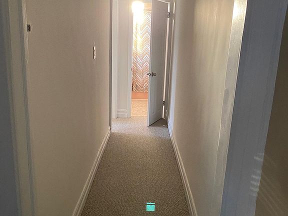 Hallway to bedrooms and bathroom