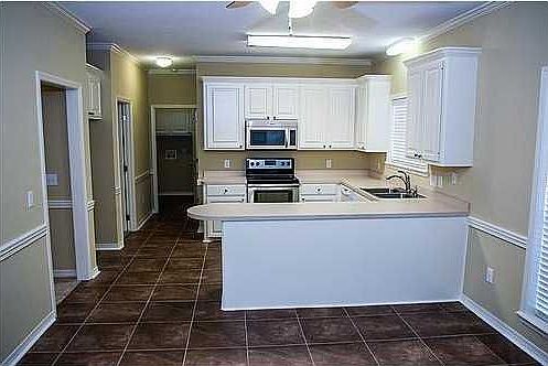 This updated home is located just steps from walking trails, boat launch, and big water views of the reservoir. The home has been meticulously updated with fresh interior paint, new flooring, new hardware, new fixtures, new appliances, and more.