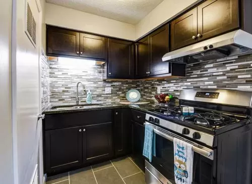 Upgraded Kitchens with Stainless Steel Appliances. - Timber Trail Apartments