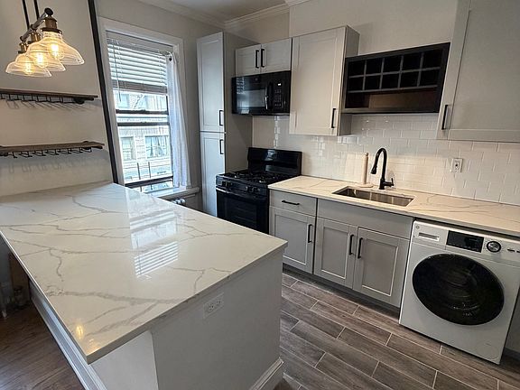 2nd image of 3047 34th St APT 2F
