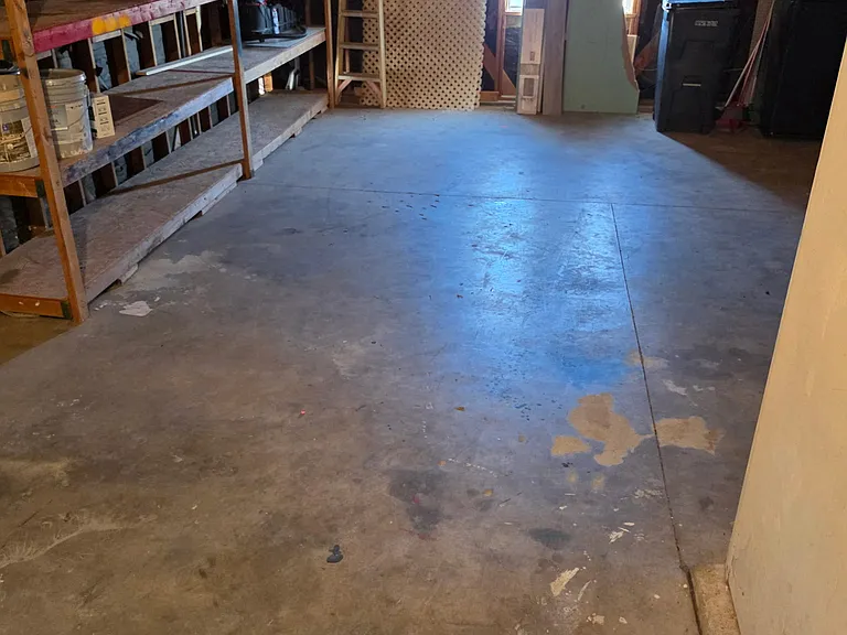 Garage shelving built-in, very sturdy, lots of storage space