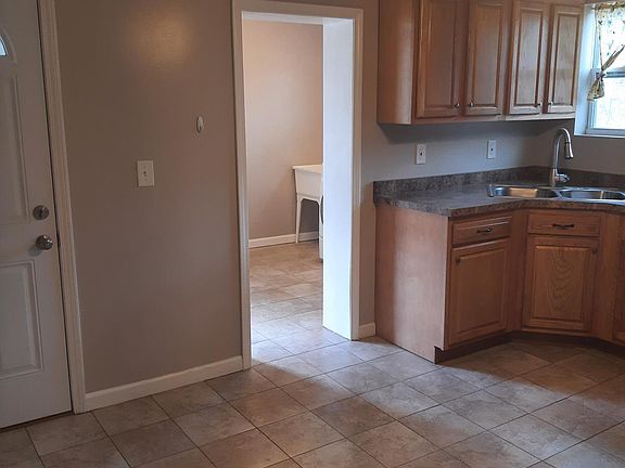 Kitchen and facing Mudroom/Laundry room