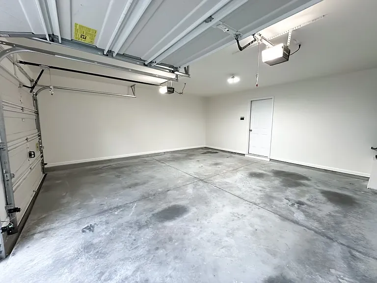 Newly furnished garage with fresh coat of paint.