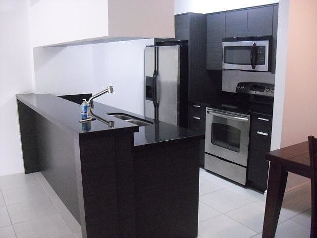 up dated kitchen with granite counter tops and stain steel a