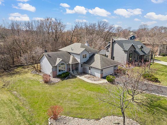 Huge side yard and private wooded backyard