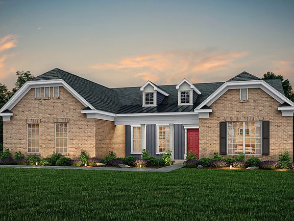 Tangerly Oak Exterior 8 features brick, siding, covered front porch and 2 car side load garage
