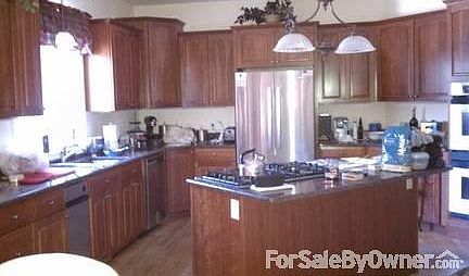 Gourmet Kitchen!
						:
						Granite counters, gas cooktop, stainless appliances, cherry cabinets