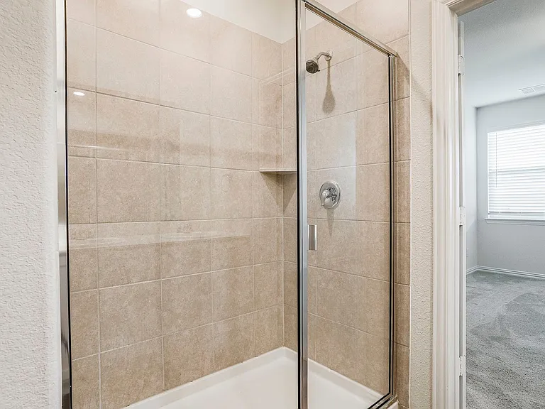 Bathroom with an enclosed shower