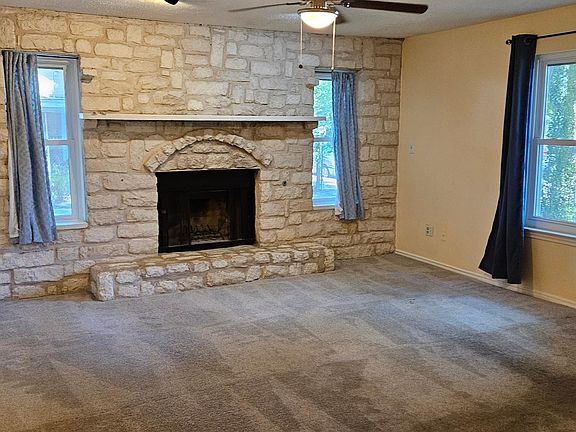 Large fenced yard, double lot. Great pecans for shade in summer.