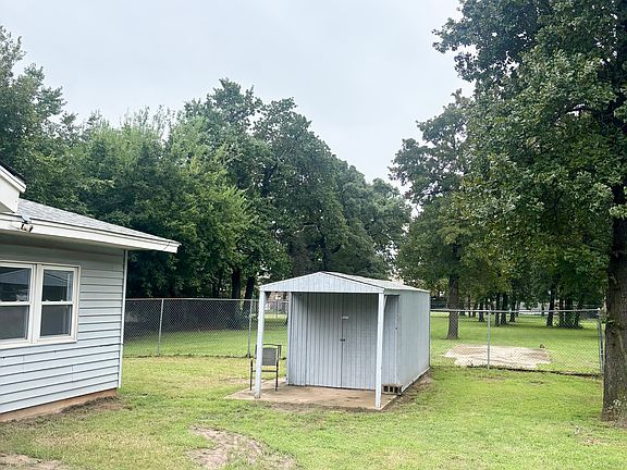 Immediate backyard with shed.