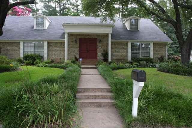 Front yard with pretty landscaping