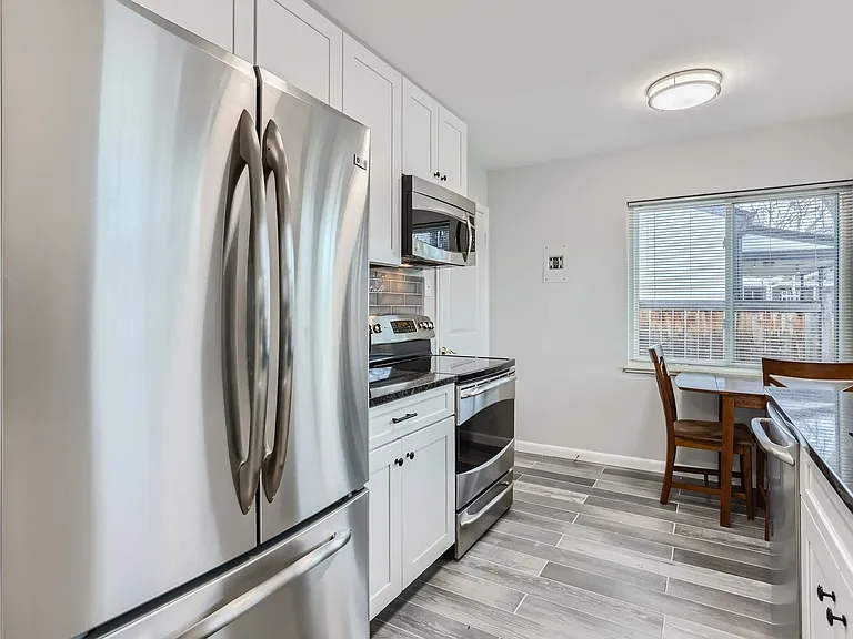 1250 E Amherst Ave — Photo 2