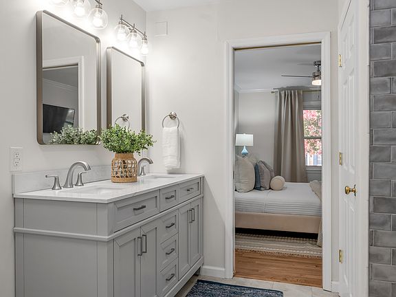 King suite bathroom with double vanity sinks