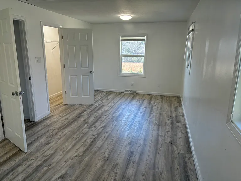 BIG primary bedroom with walk-in closet.