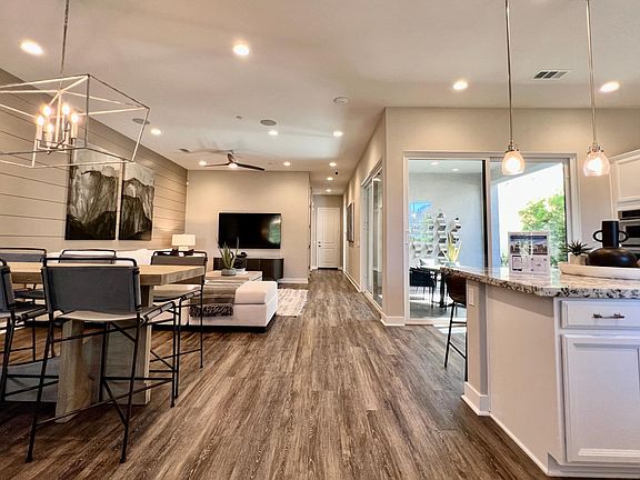 Kitchen, Dining Area, Living Room and Hall Way