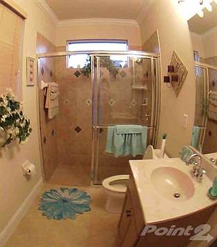 Bath room off bedroom 2 and pool area