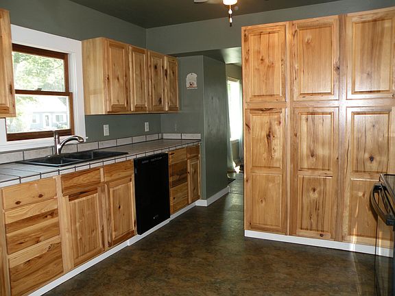 Newer hickory kitchen cabinets.