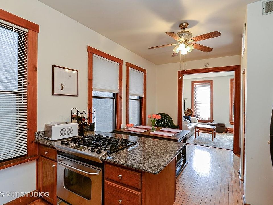 Kitchen with stainless appliances and granite countertop