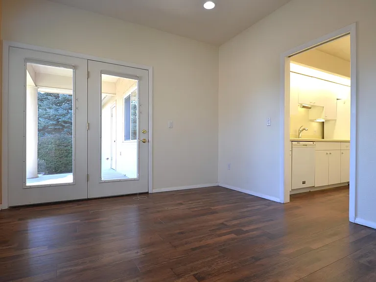 French Doors Lead from Dining Room to Covered Patio.