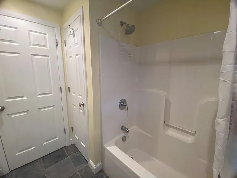 First Floor Bath Tub and Linen Closet