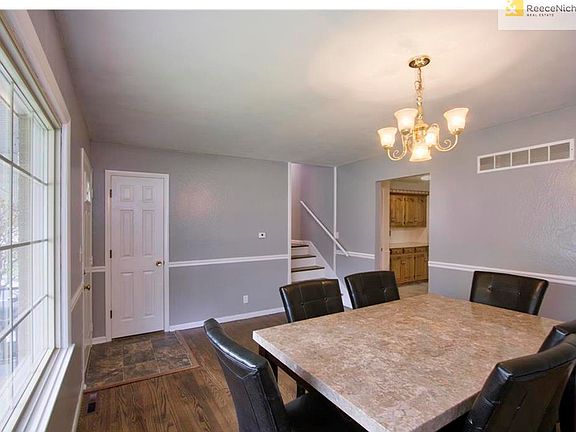 GORGEOUS WALL COLOR AND TRIM ACCENT THE ORIGINAL HARDWOODS IN HERE