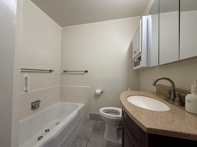 2nd bathroom with separate bath and shower
