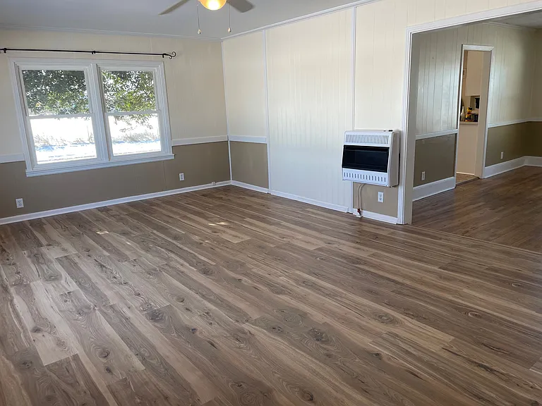 Another view of living room and partially into the dining room.