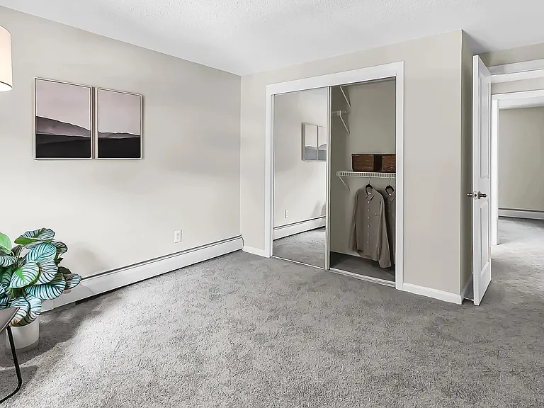 Discover effortless storage solutions in our roomy closets with convenient built-in organizers.