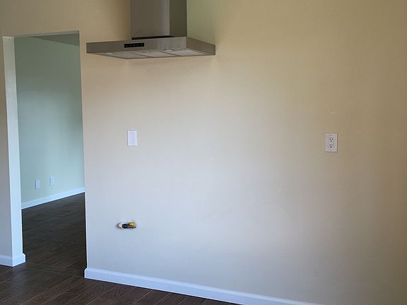Kitchen hood above stove area
