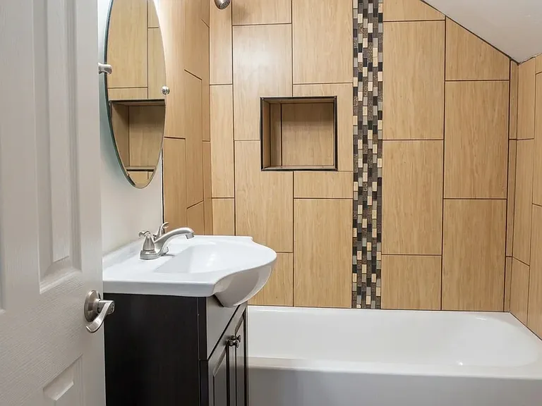 7739 Raleigh St — Photo 5