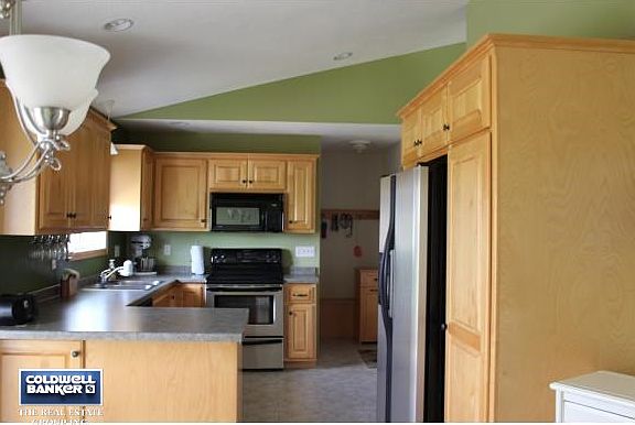 Kitchen Opens to Dining Area.