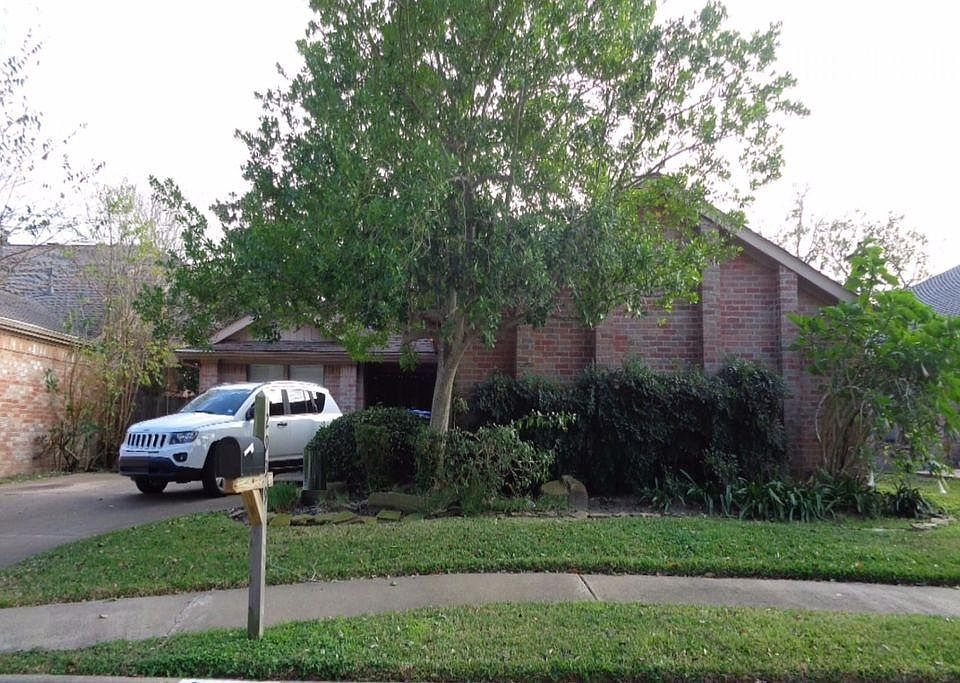 Great curb appeal on a well-maintained block.
