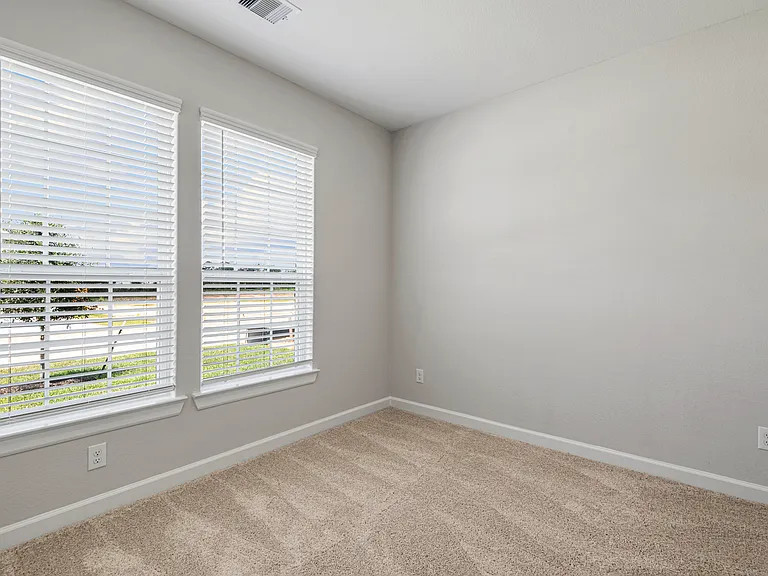 Bedroom with carpet flooring