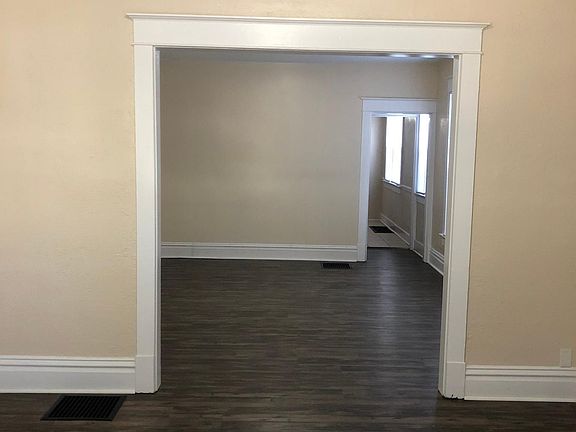 Living room opens into the dining room for a large open concept design