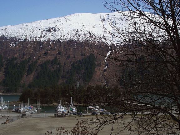 view of harbor, channel, mountains