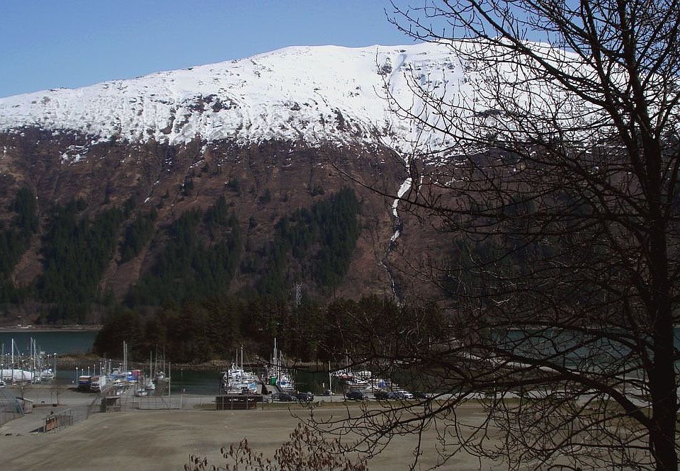 view of harbor, channel, mountains