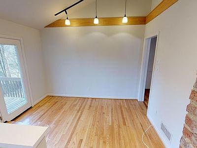 Dining Area with a Scenic Backyard View