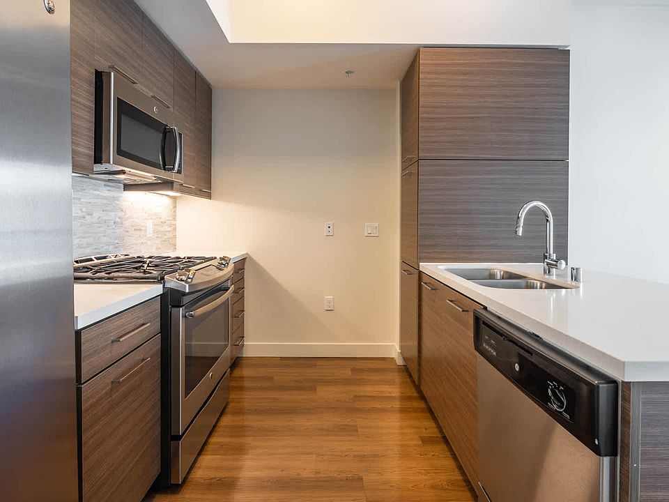 Kitchen with Stainless Steel Appliances and Breakfast Bar