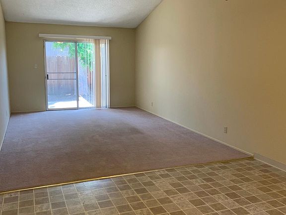 Large living room and dining room, 
access through slider to back yard