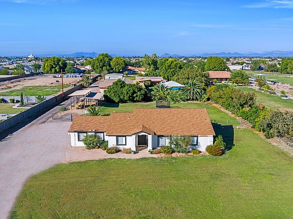 One acre property with plenty of parking, RV carport, and no HOA