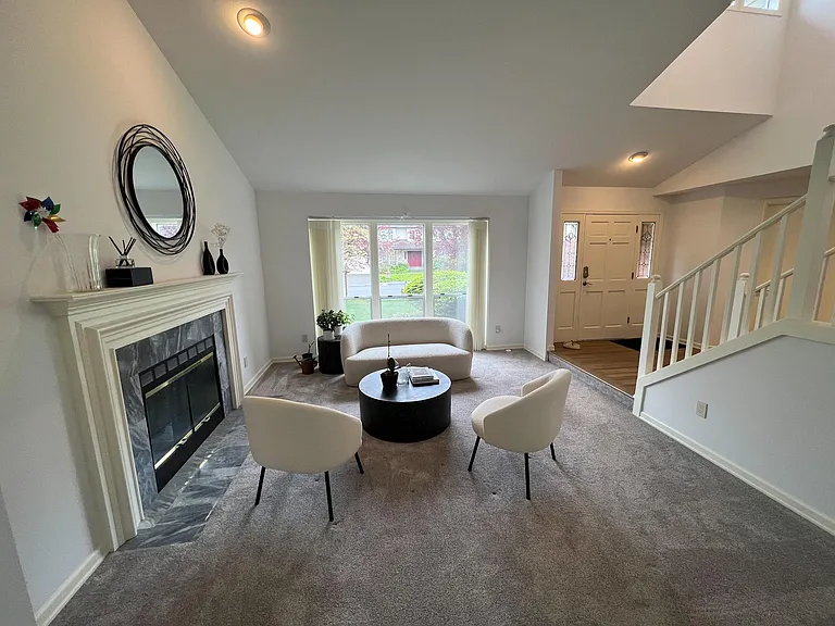 living room/entry with bay window