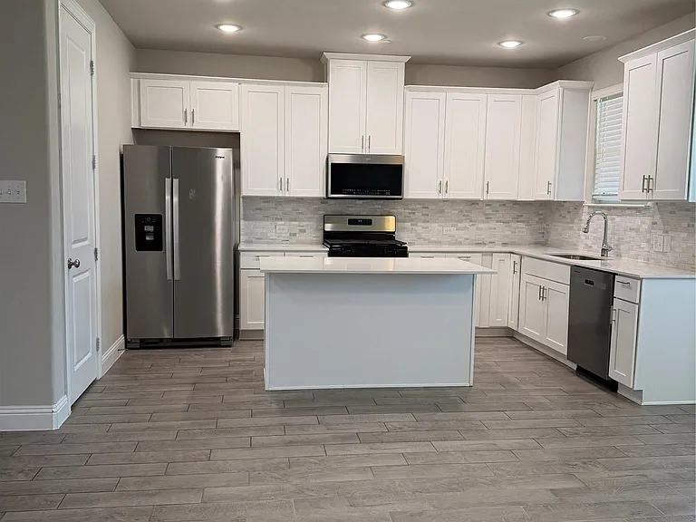Kitchen with fridge