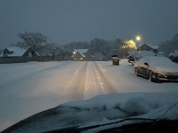 Street driving up to house