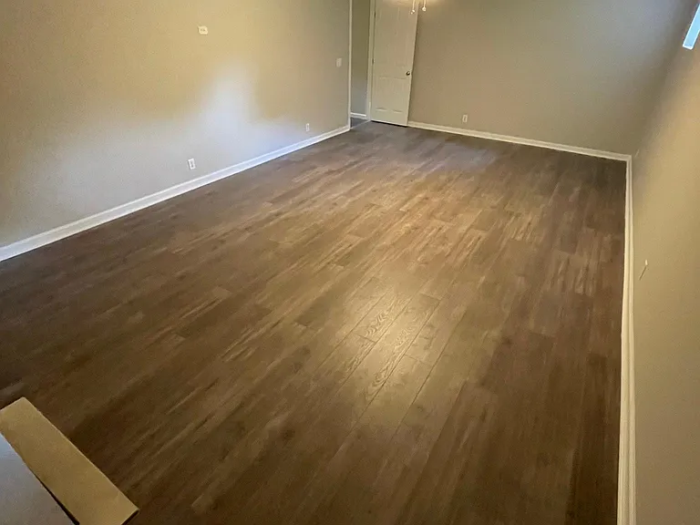 Large bonus room on the first floor can be a large office, media room, or a 4th bedroom