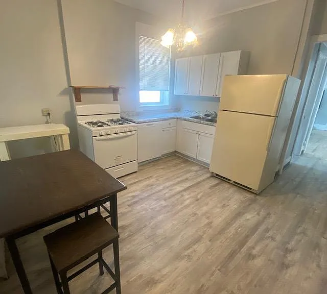 1573 Tibbits Ave — Photo 3